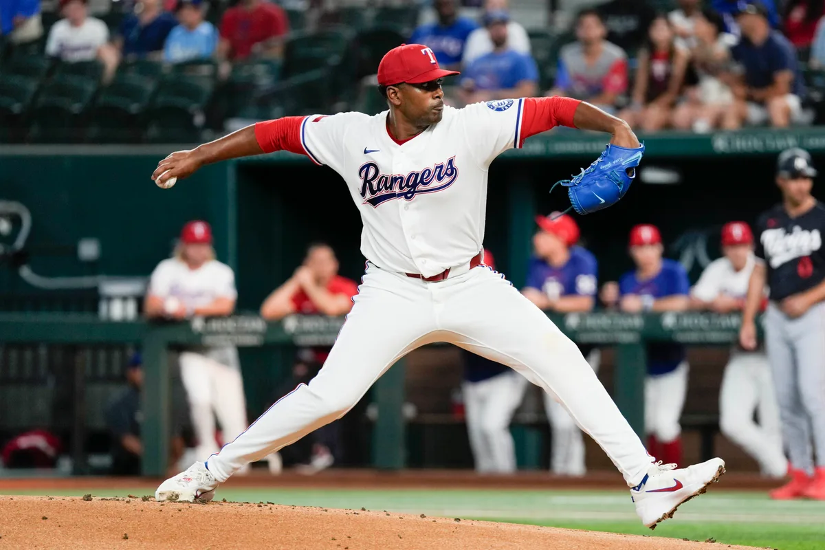 Jun 16, 2026; Arlington, Texas, USA; Texas Rangers starting pitcher Kumar Rocker (80) delivers a pitch to the Minnesota Twins during the first inning at Globe Life Field. Mandatory Credit: Jim Cowsert-Imagn Images