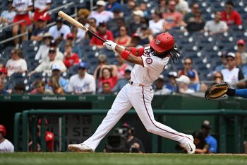 Jun 17, 2026; Washington, District of Columbia, USA; Washington Nationals shortstop CJ Abrams (5) hits a RBI double against the Kansas City Royals during the sixth inning at Nationals Park. Mandatory Credit: Brad Mills-Imagn Images