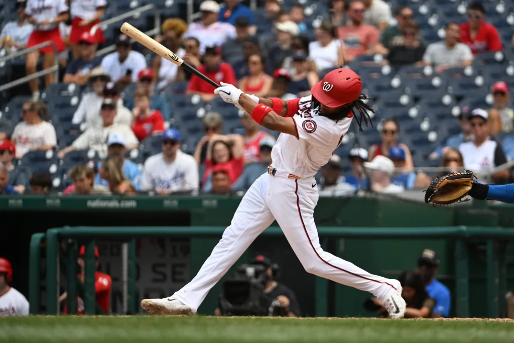 Jun 17, 2026; Washington, District of Columbia, USA; Washington Nationals shortstop CJ Abrams (5) hits a RBI double against the Kansas City Royals during the sixth inning at Nationals Park. Mandatory Credit: Brad Mills-Imagn Images