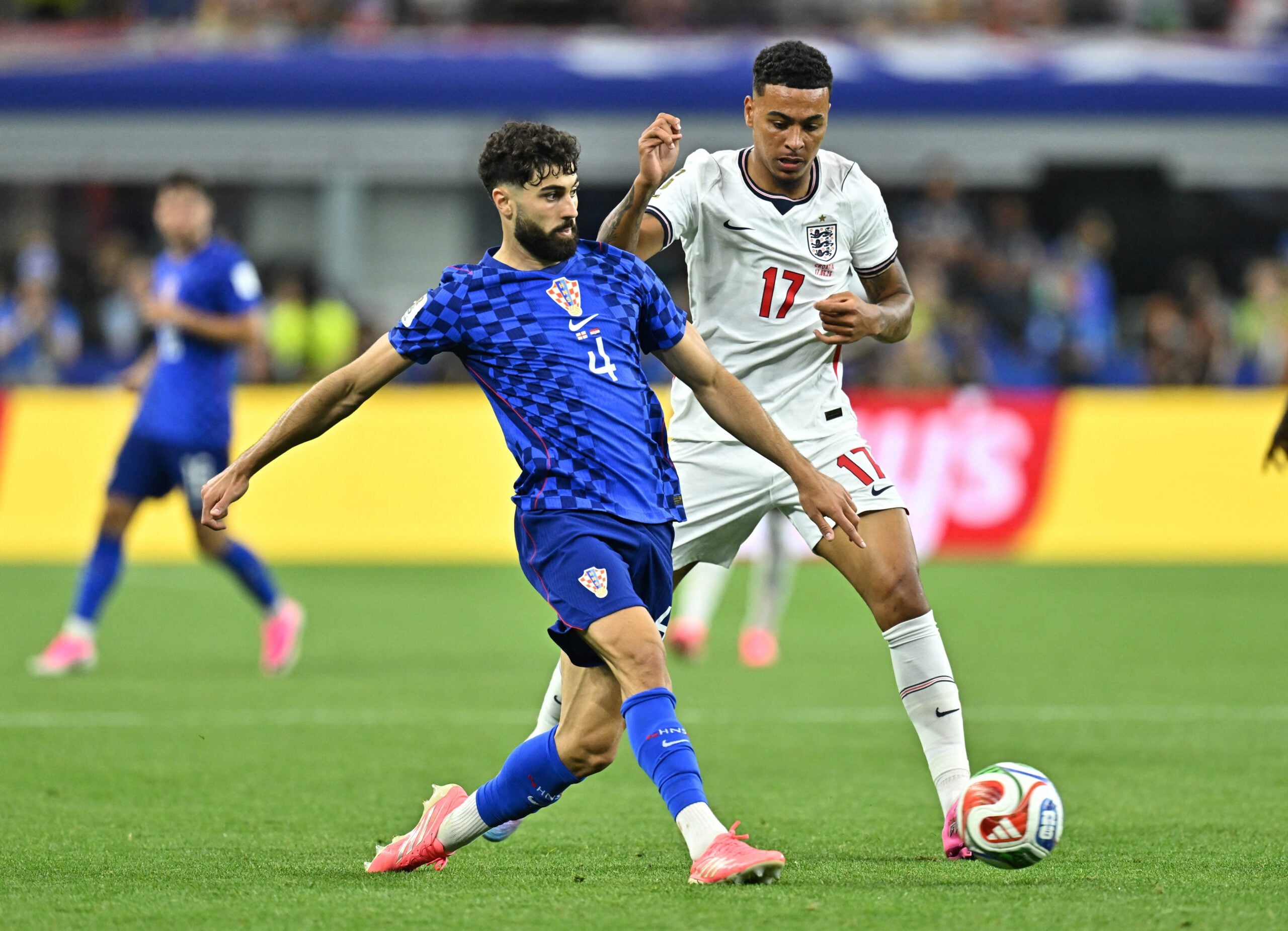 June 17, 2026; Arlington, Texas, U.S.; Croatia's Josko Gvardiol in action with England's Morgan Rogers.  Mandatory Credit: Maria Lysaker-Imagn Images