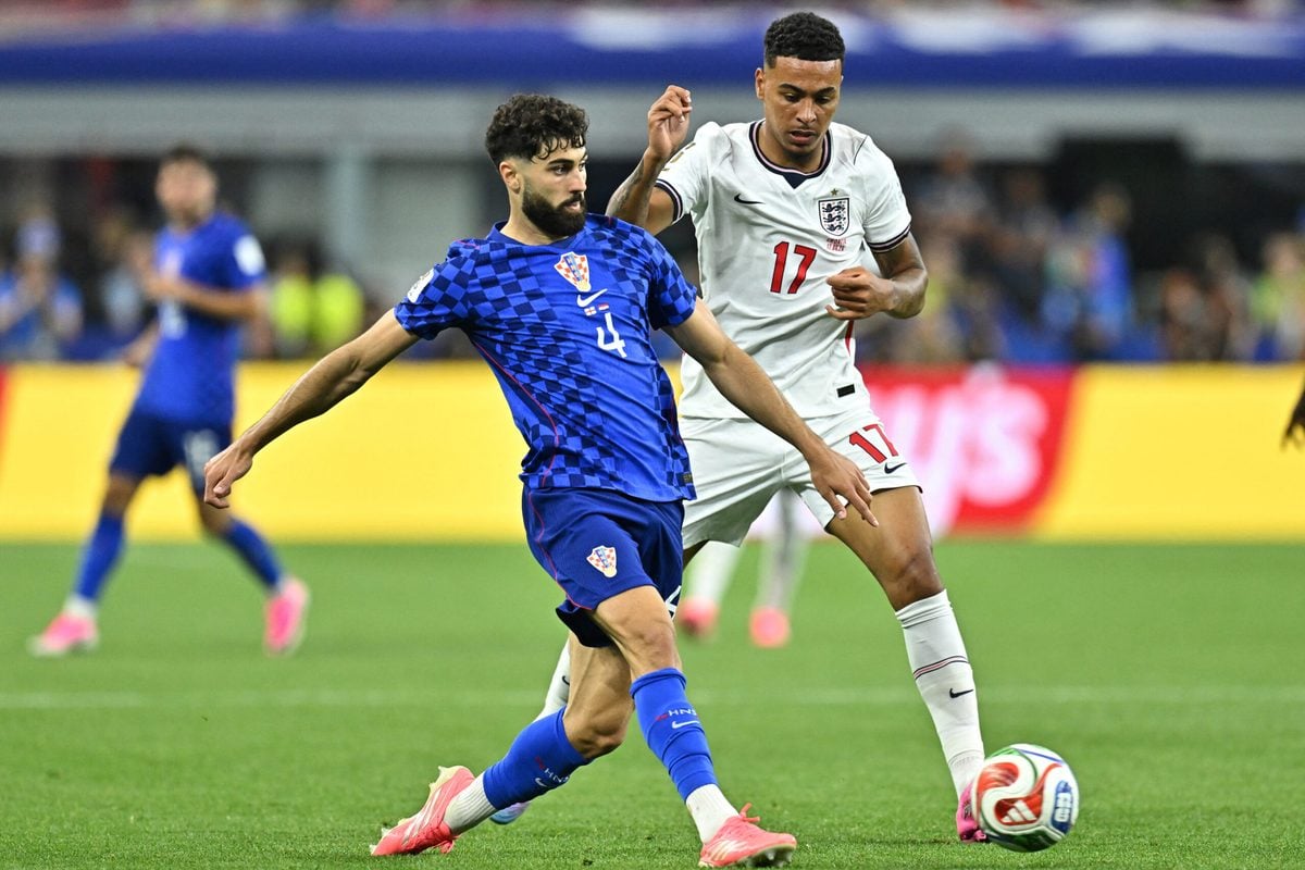 June 17, 2026; Arlington, Texas, U.S.; Croatia's Josko Gvardiol in action with England's Morgan Rogers. Mandatory Credit: Maria Lysaker-Imagn Images