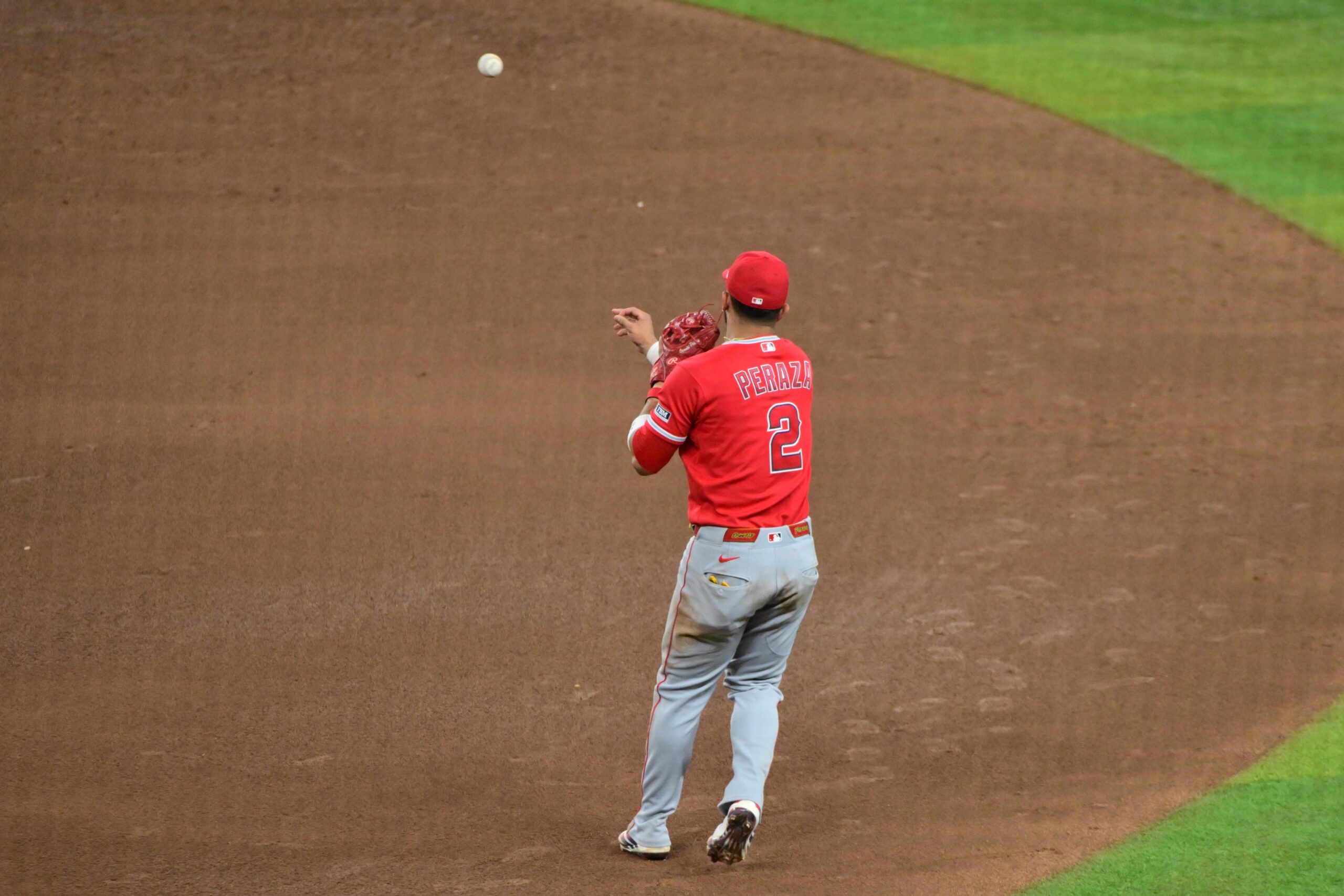 Jun 17, 2026; Phoenix, Arizona, USA; Los Angeles Angels second baseman Oswald Peraza (2) throws to second base in the sixth inning against the Arizona Diamondbacks at Chase Field. Mandatory Credit: Matt Kartozian-Imagn Images