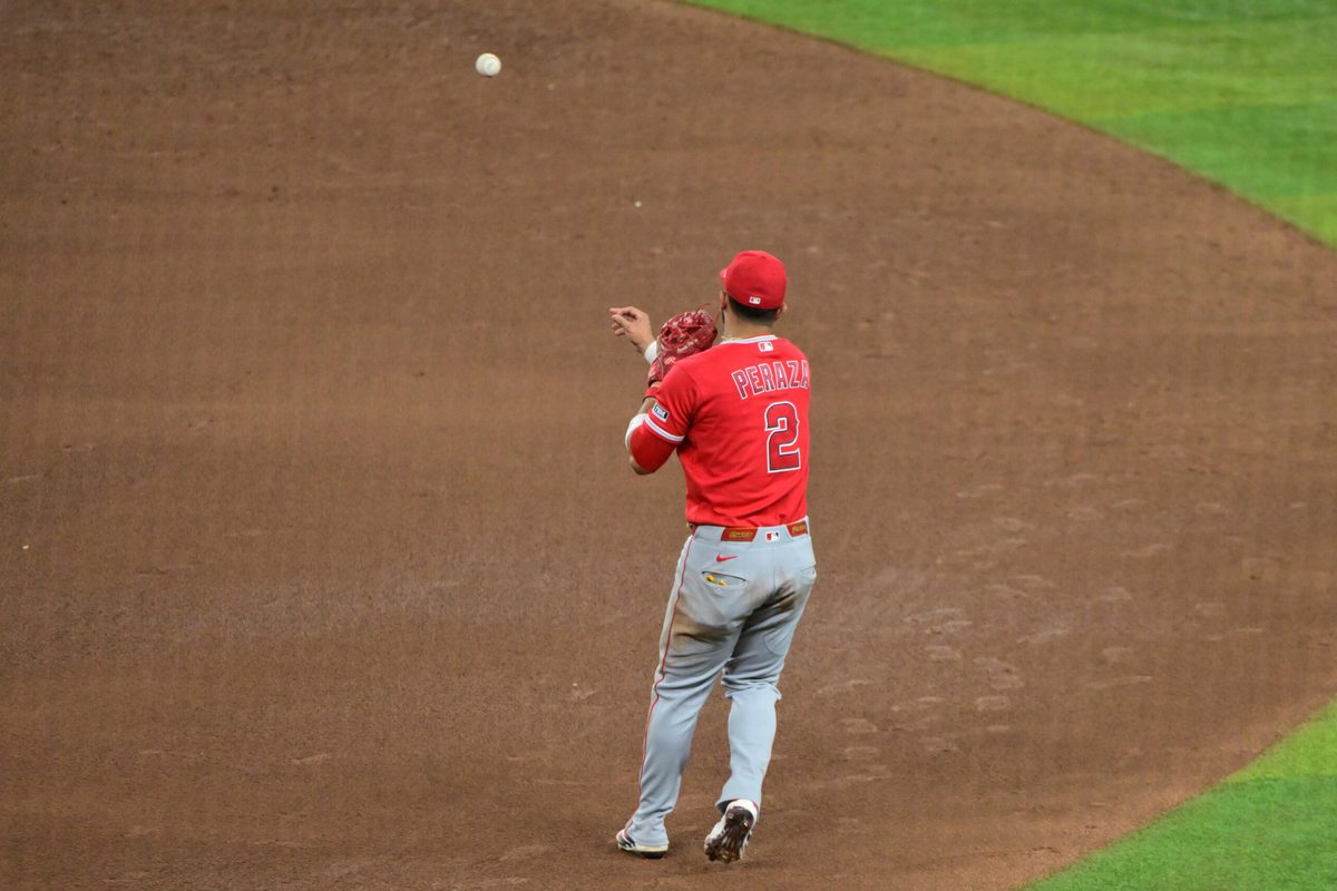 Jun 17, 2026; Phoenix, Arizona, USA; Los Angeles Angels second baseman Oswald Peraza (2) throws to second base in the sixth inning against the Arizona Diamondbacks at Chase Field. Mandatory Credit: Matt Kartozian-Imagn Images