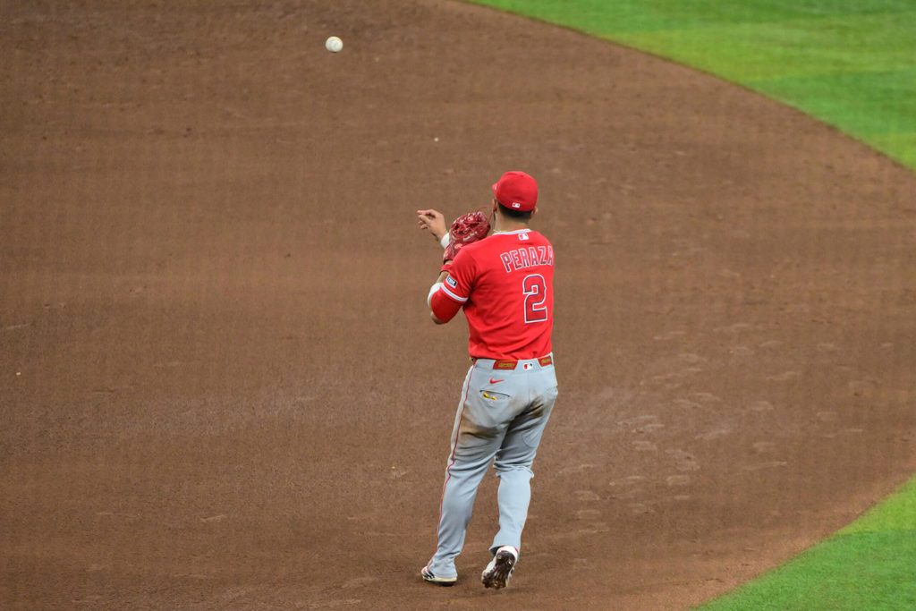 Jun 17, 2026; Phoenix, Arizona, USA; Los Angeles Angels second baseman Oswald Peraza (2) throws to second base in the sixth inning against the Arizona Diamondbacks at Chase Field. Mandatory Credit: Matt Kartozian-Imagn Images
