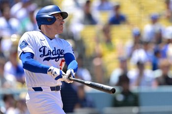 Jun 17, 2026; Los Angeles, California, USA;  Los Angeles Dodgers first baseman Freddie Freeman (5) hits a two-run home run during the sixth inning against the Tampa Bay Rays at Dodger Stadium. Mandatory Credit: Jayne Kamin-Oncea-Imagn Images