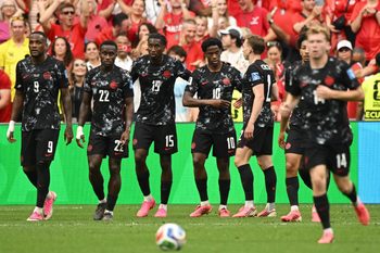 June 18, 2026; Vancouver, Canada; Canada's Jonathan David celebrates scoring their sixth goal with teammates to complete a hat-trick.  Mandatory Credit: Anne-Marie Sorvin-Imagn Images
