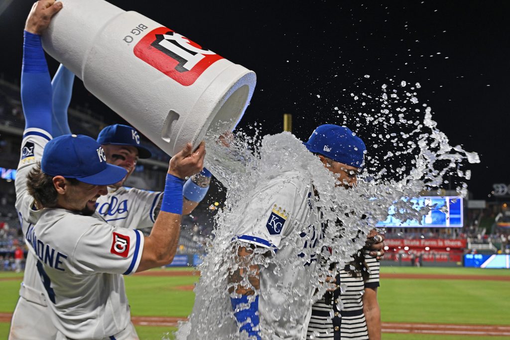 Jun 18, 2026; Kansas City, Missouri, USA; Kansas City Royals catcher Salvador Perez (13) gets a victory dunk from first baseman Jac Caglianone (14) and designated hitter Carter Jensen (22) after defeating the St. Louis Cardinals at Kauffman Stadium. Mandatory Credit: Peter Aiken-Imagn Images