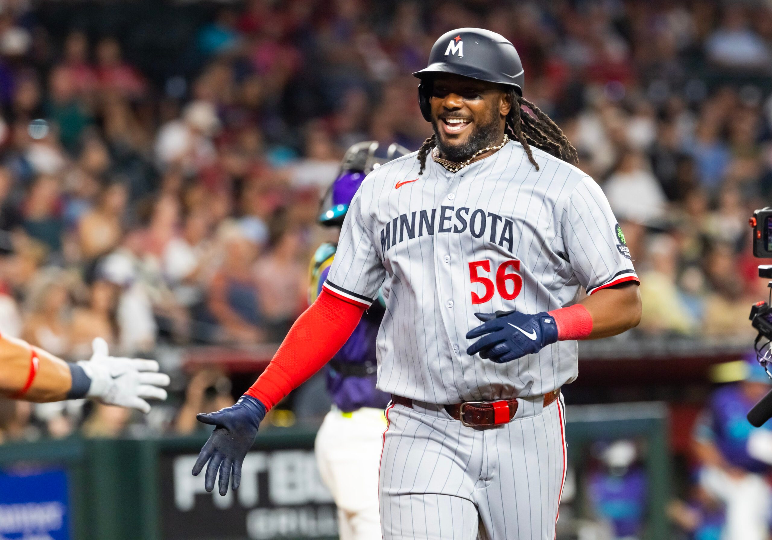 Jun 19, 2026; Phoenix, Arizona, USA; Minnesota Twins designated hitter Josh Bell celebrates after hitting a solo home run in the eighth inning against the Arizona Diamondbacks at Chase Field. Mandatory Credit: Mark J. Rebilas-Imagn Images