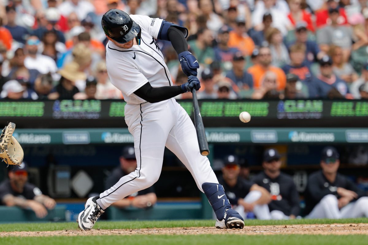 Jun 20, 2026; Detroit, Michigan, USA; Detroit Tigers catcher Dillon Dingler (13) hits an RBI single in the fifth inning against the Chicago White Sox at Comerica Park. Mandatory Credit: Rick Osentoski-Imagn Images