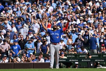 Jun 20, 2026; Chicago, Illinois, USA; Toronto Blue Jays first baseman Vladimir Guerrero Jr. (27) celebrates after defeating the Chicago Cubs at Wrigley Field. Mandatory Credit: Patrick Gorski-Imagn Images