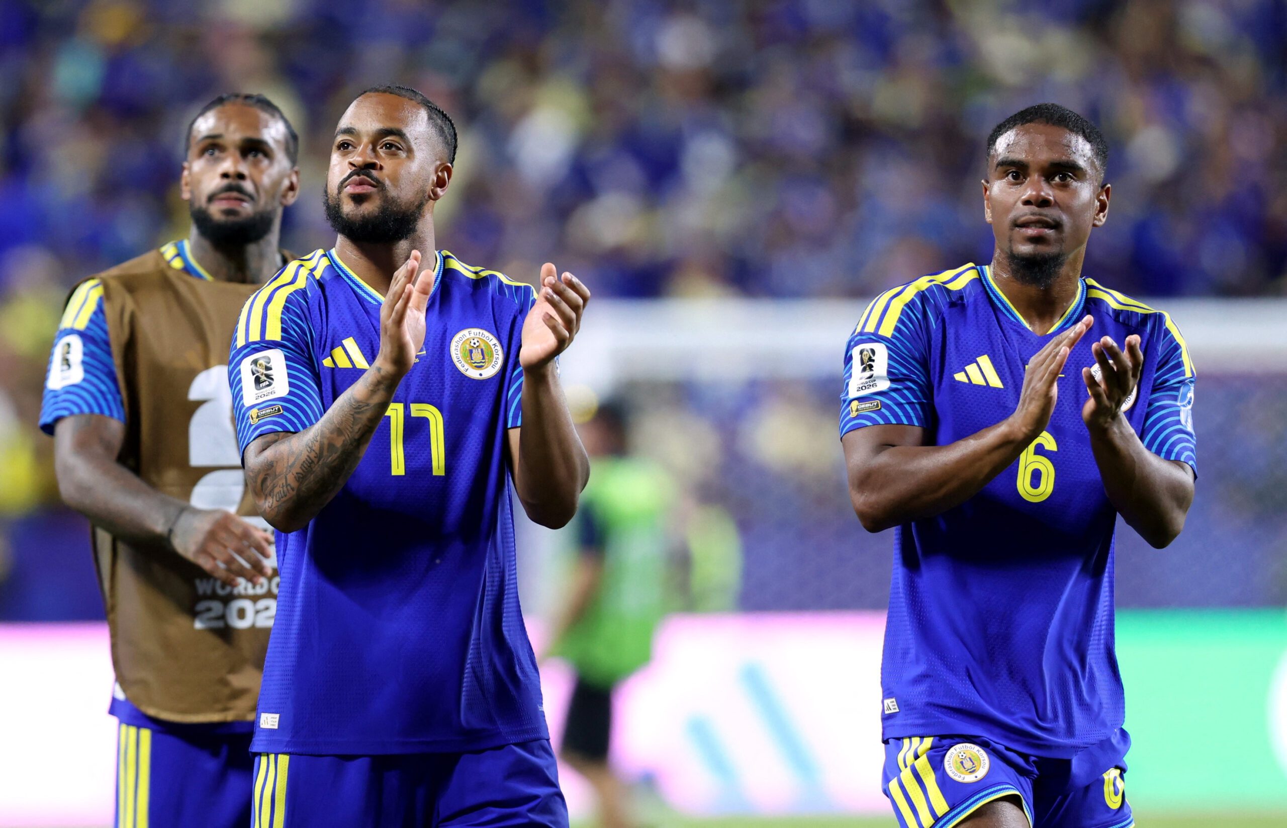 June 20, 2026; Kansas City, Missouri, U.S.; Curacao's Brandley Kuwas and Godfried Roemeratoe react after the match.  Mandatory Credit: Kylie Graham-Imagn Images