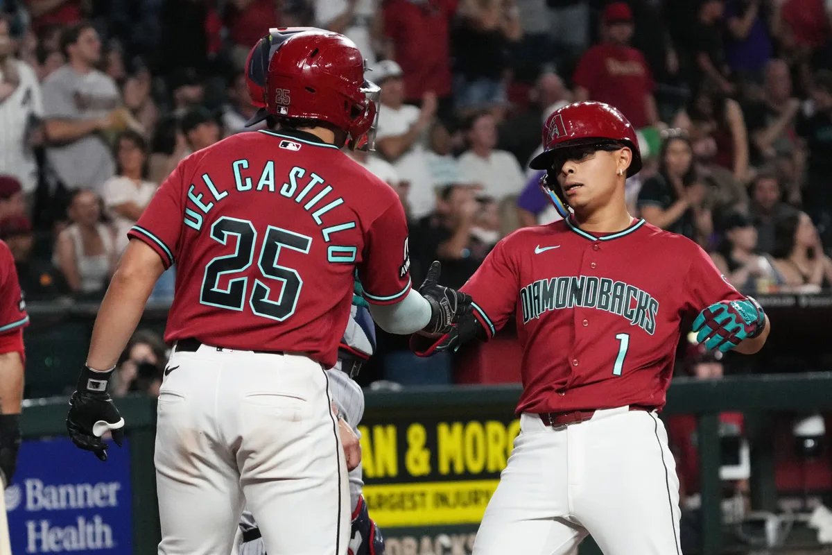 Jun 20, 2026; Phoenix, Arizona, USA; Arizona Diamondbacks center fielder Jorge Barrosa (1) celebrates with Adrian del Castillo (25) after hitting a two-run home run against the Minnesota Twins in the fifth inning at Chase Field. Mandatory Credit: Rick Scuteri-Imagn Images