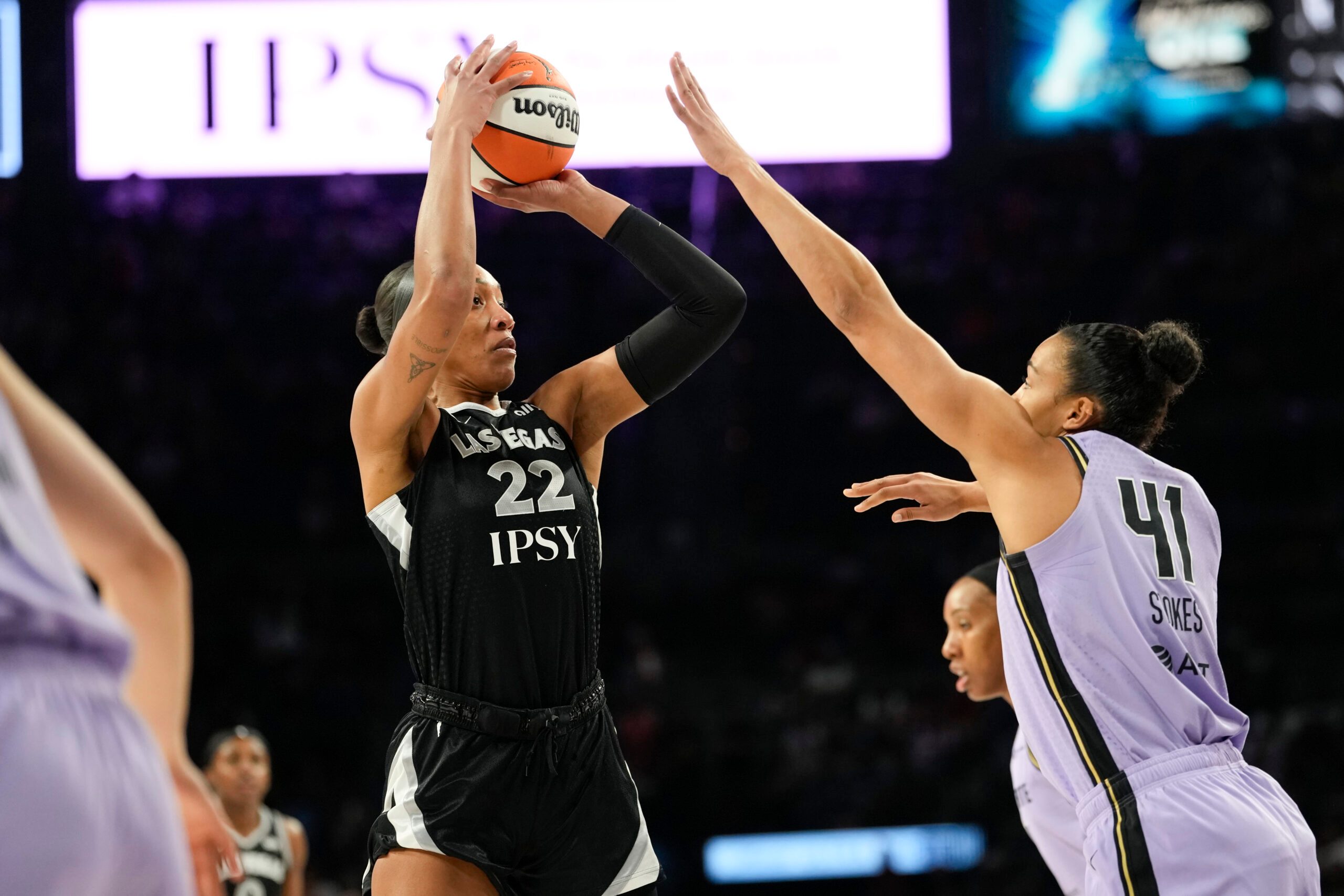 Jun 21, 2026; Las Vegas, Nevada, USA; Las Vegas Aces center A'ja Wilson (22) shoots the ball against Golden State Valkyries center Kiah Stokes (41) during the first quarter of a WNBA basketball game at Michelob Ultra Arena. Mandatory Credit: Lucas Peltier-Imagn Images