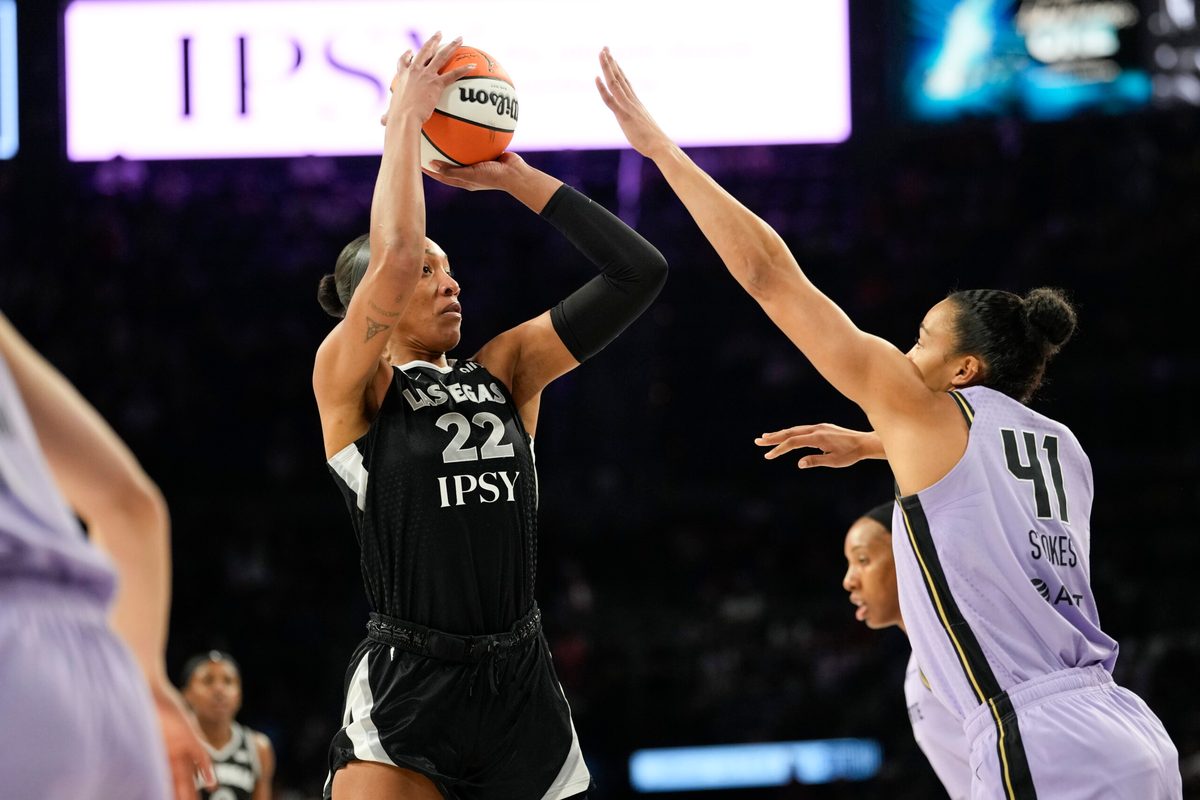 Jun 21, 2026; Las Vegas, Nevada, USA; Las Vegas Aces center A'ja Wilson (22) shoots the ball against Golden State Valkyries center Kiah Stokes (41) during the first quarter of a WNBA basketball game at Michelob Ultra Arena. Mandatory Credit: Lucas Peltier-Imagn Images