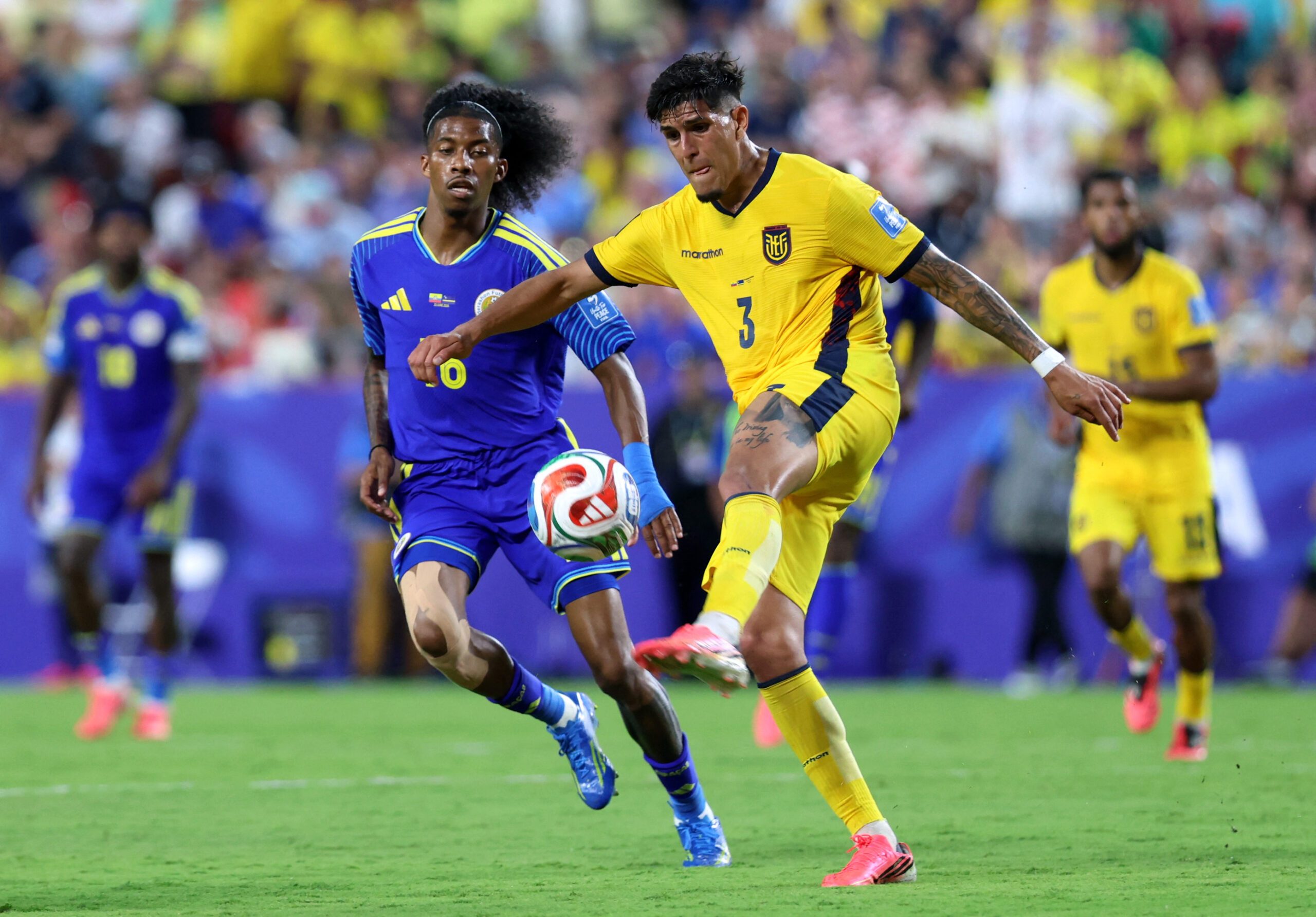 June 20, 2026; Kansas City, Missouri, U.S.; Ecuador defender Piero Hincapie (3) in action with Curacao forward Jearl Margaritha (16).  Mandatory Credit: Kylie Graham-Imagn Images