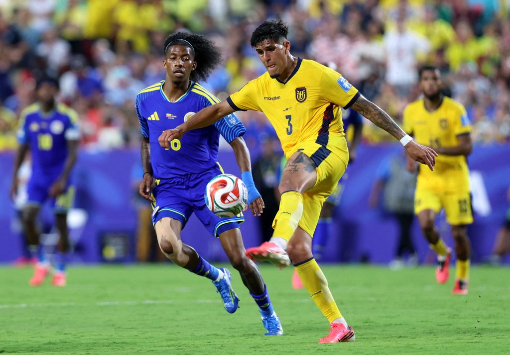 June 20, 2026; Kansas City, Missouri, U.S.; Ecuador defender Piero Hincapie (3) in action with Curacao forward Jearl Margaritha (16). Mandatory Credit: Kylie Graham-Imagn Images