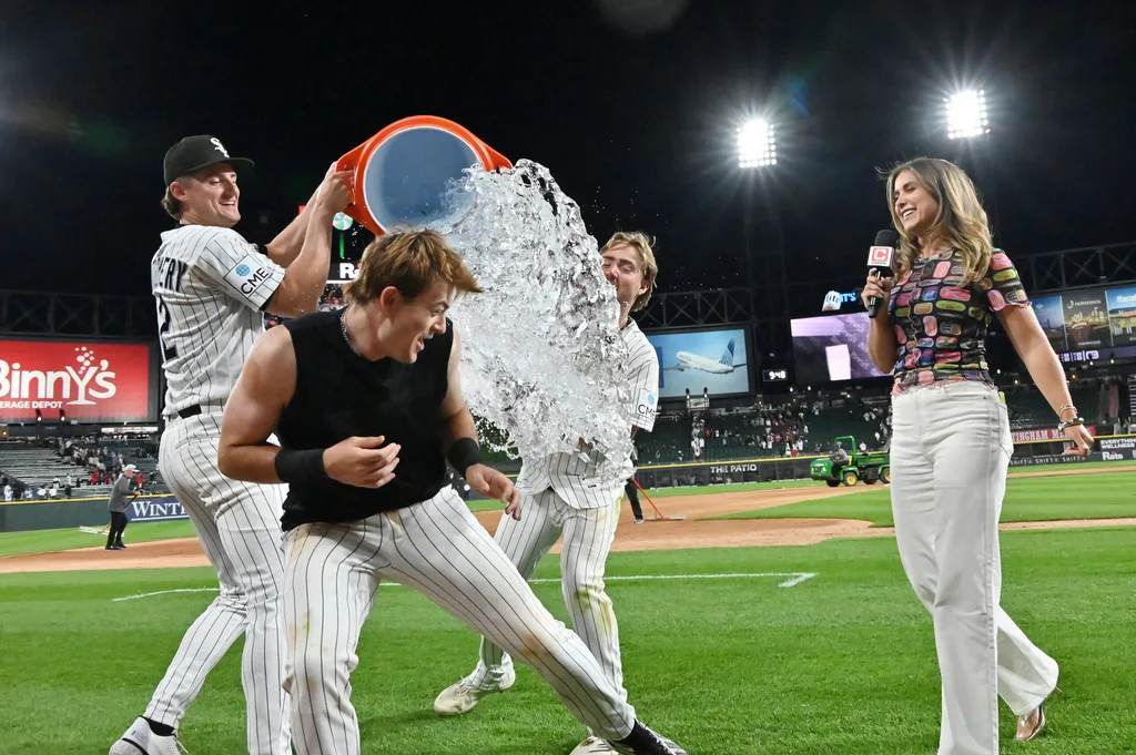 Jun 22, 2026; Chicago, Illinois, USA; Chicago White Sox third baseman Colson Montgomery (12) and second baseman Chase Meidroth (10) attempt to dunk left fielder Sam Antonacci (17) after defeating the Cleveland Guardians at Rate Field. Mandatory Credit: Patrick Gorski-Imagn Images