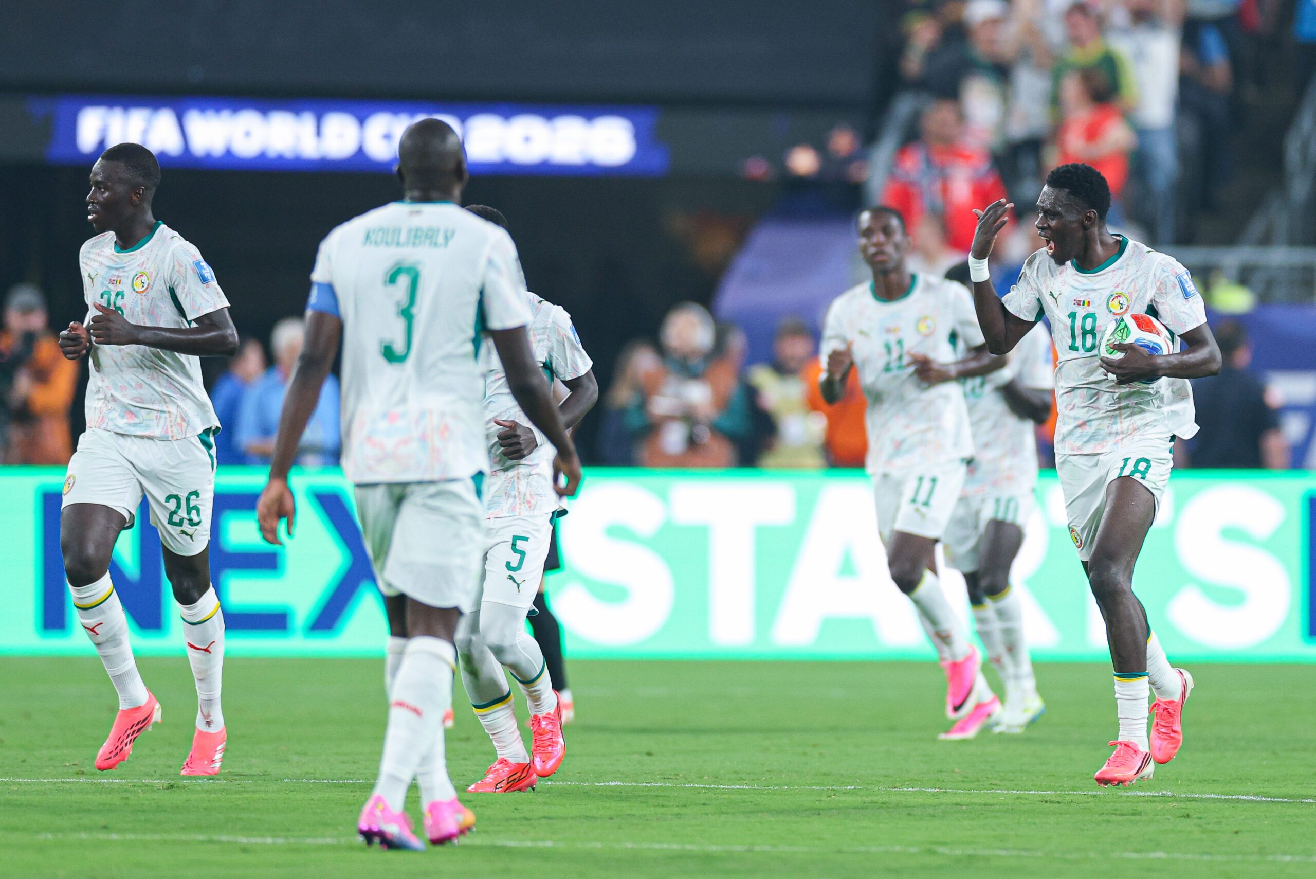 Jun 22, 2026; East Rutherford, New Jersey, USA; Senegal midfielder Ismaila Sarr (18) celebrates after scoring a goal against Norway during a Group I match of the 2026 FIFA World Cup at New York New Jersey Stadium. Mandatory Credit: Vincent Carchietta-Imagn Images