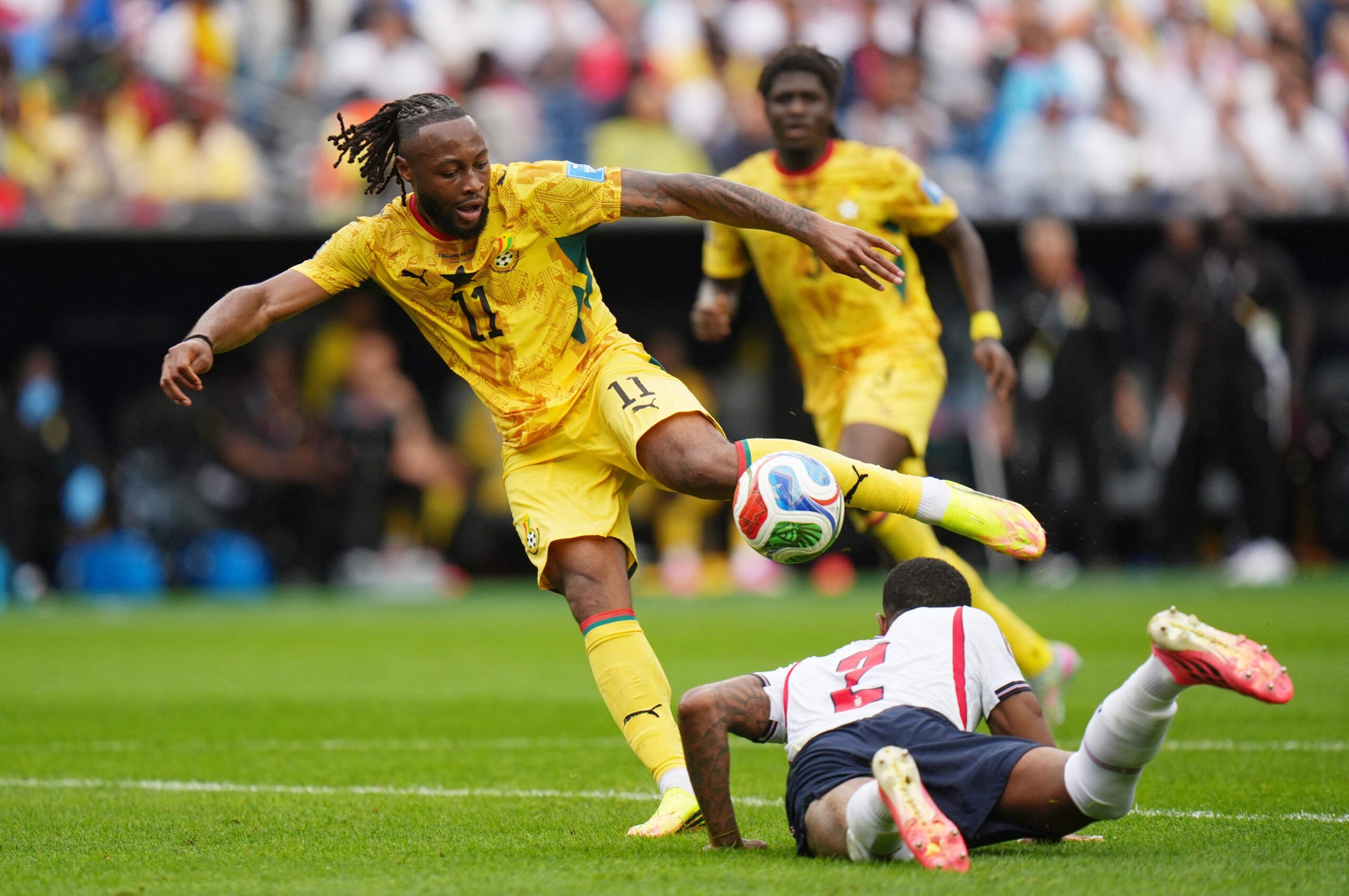 June 23, 2026; Foxborough, Massachusetts, U.S.; Ghana's Antoine Semenyo in action with England's Ezri Konsa.  Mandatory Credit: David Butler Ii-Imagn Images