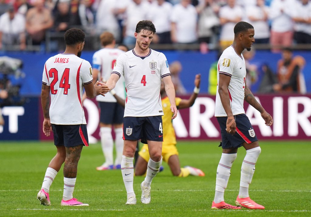 June 23, 2026; Foxborough, Massachusetts, U.S.; England's Declan Rice, Reece James and Ezri Konsa look dejected after the match. Mandatory Credit: David Butler Ii-Imagn Images