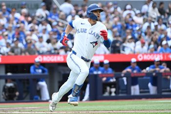 Jun 23, 2026; Toronto, Ontario, CAN;  Toronto Blue Jays shortstop Andres Gimenez (0) runs the bases after hitting a double against the Houston Astros in the second inning at Rogers Centre. Mandatory Credit: Dan Hamilton-Imagn Images
