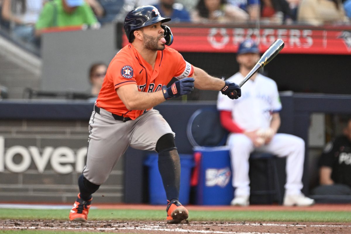 Jun 23, 2026; Toronto, Ontario, CAN;  Houston Astros second baseman Jose Altuve (27) hits a double against the Toronto Blue Jays in the fourth inning at Rogers Centre. Mandatory Credit: Dan Hamilton-Imagn Images