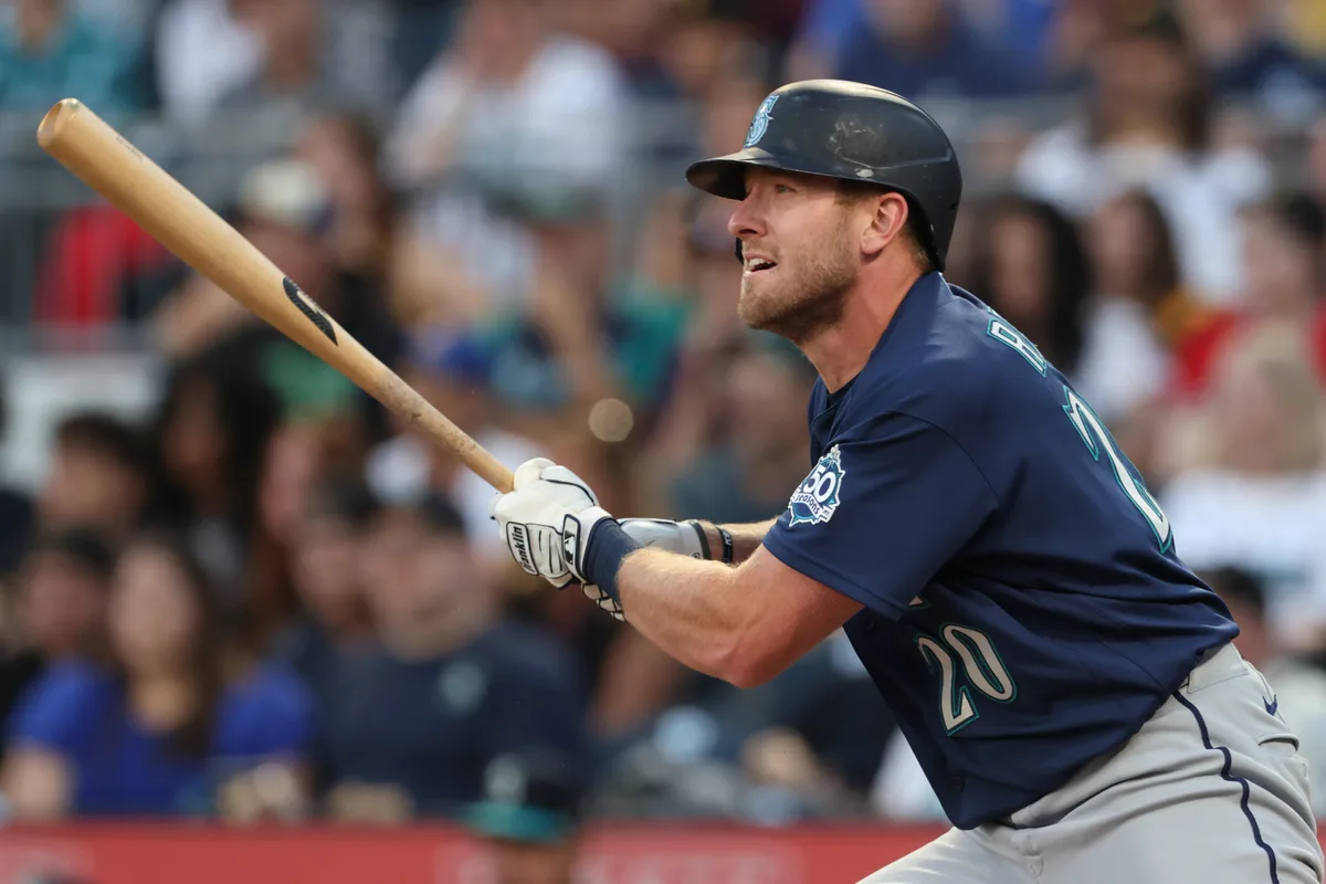 Jun 23, 2026; Pittsburgh, Pennsylvania, USA; Seattle Mariners right fielder Luke Raley (20) hits a double against the Pittsburgh Pirates during the seventh inning at PNC Park. Mandatory Credit: Charles LeClaire-Imagn Images