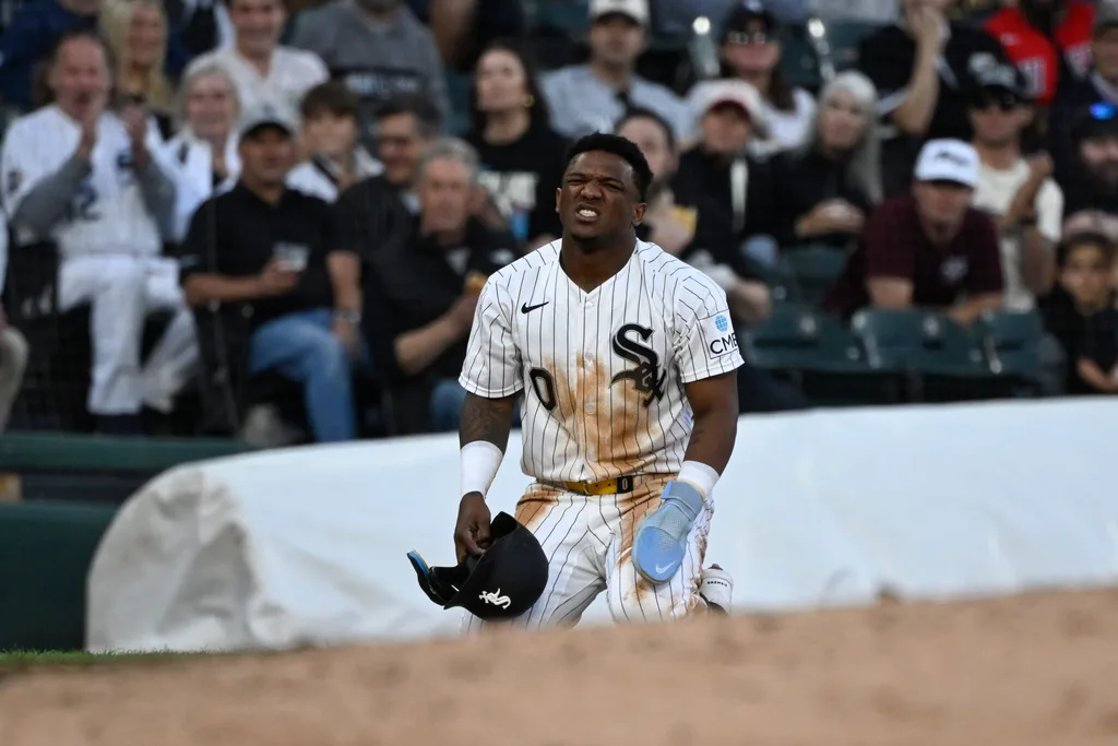 Jun 23, 2026; Chicago, Illinois, USA; Chicago White Sox center fielder Luisangel Acuña (0) grimaces after advancing to third base during the fifth inning against the Cleveland Guardians at Rate Field. Mandatory Credit: Matt Marton-Imagn Images