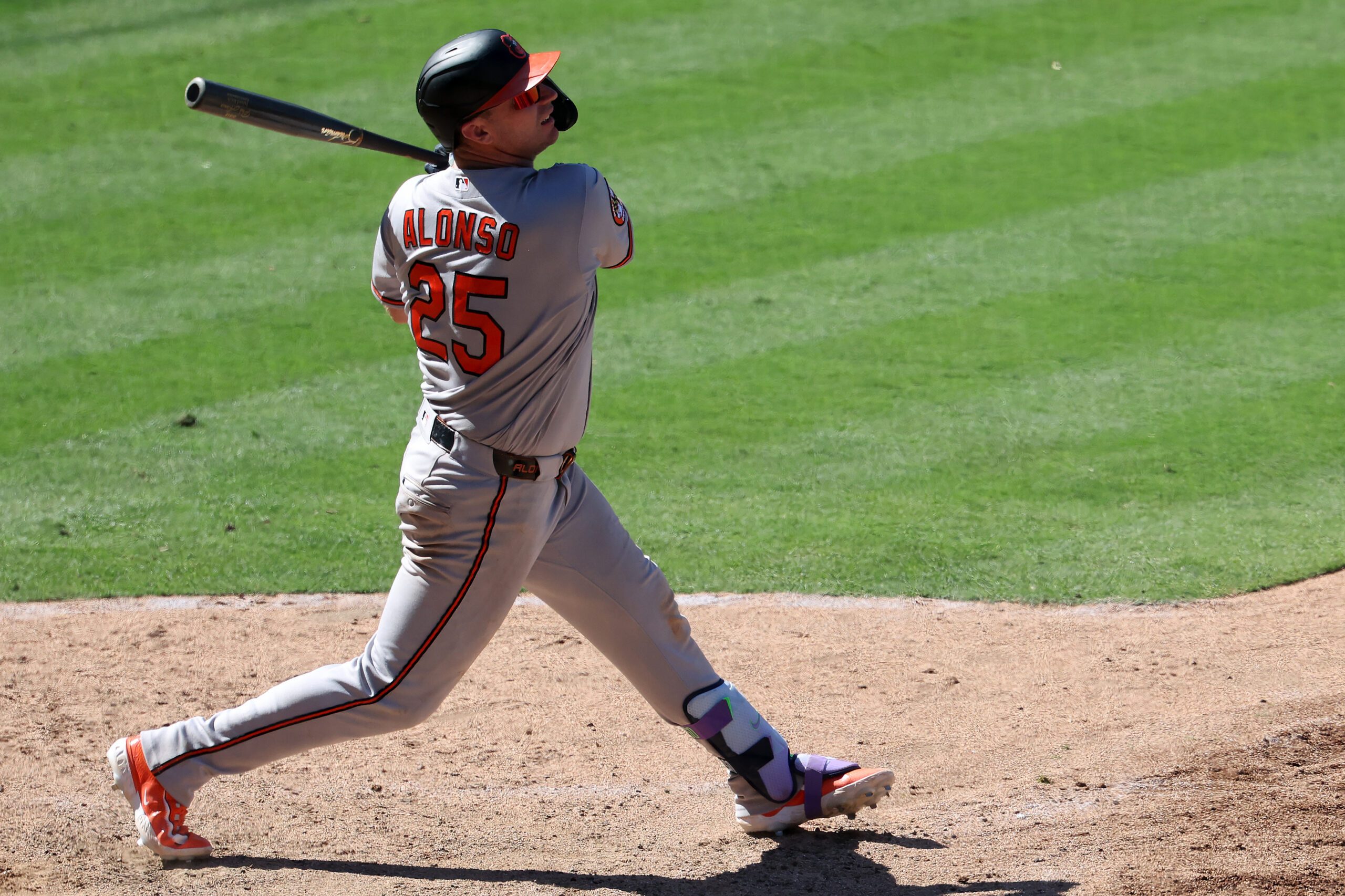 Jun 24, 2026; Anaheim, California, USA;  Baltimore Orioles first baseman Pete Alonso (25) hits an RBI single during the tenth inning against the Los Angeles Angels at Angel Stadium. Mandatory Credit: Kiyoshi Mio-Imagn Images