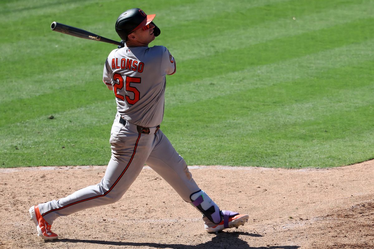 Jun 24, 2026; Anaheim, California, USA;  Baltimore Orioles first baseman Pete Alonso (25) hits an RBI single during the tenth inning against the Los Angeles Angels at Angel Stadium. Mandatory Credit: Kiyoshi Mio-Imagn Images