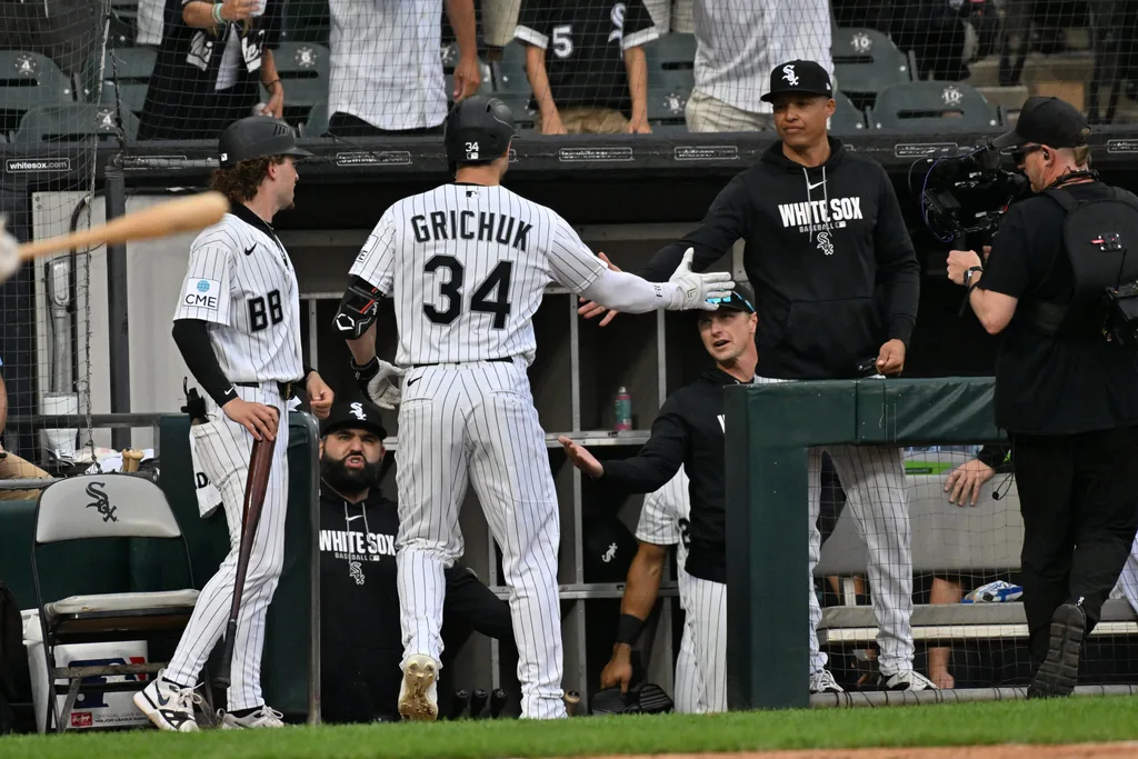 Jun 24, 2026; Chicago, Illinois, USA; Chicago White Sox outfielder Randal Grichuk (34) celebrates with manager Will Venable after hitting a home run against the Cleveland Guardians during the ninth inning at Rate Field. Mandatory Credit: Patrick Gorski-Imagn Images