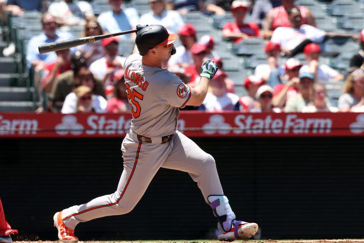 Jun 24, 2026; Anaheim, California, USA;  Baltimore Orioles first baseman Pete Alonso (25) hits an RBI double during the third inning against the Los Angeles Angels at Angel Stadium. Mandatory Credit: Kiyoshi Mio-Imagn Images