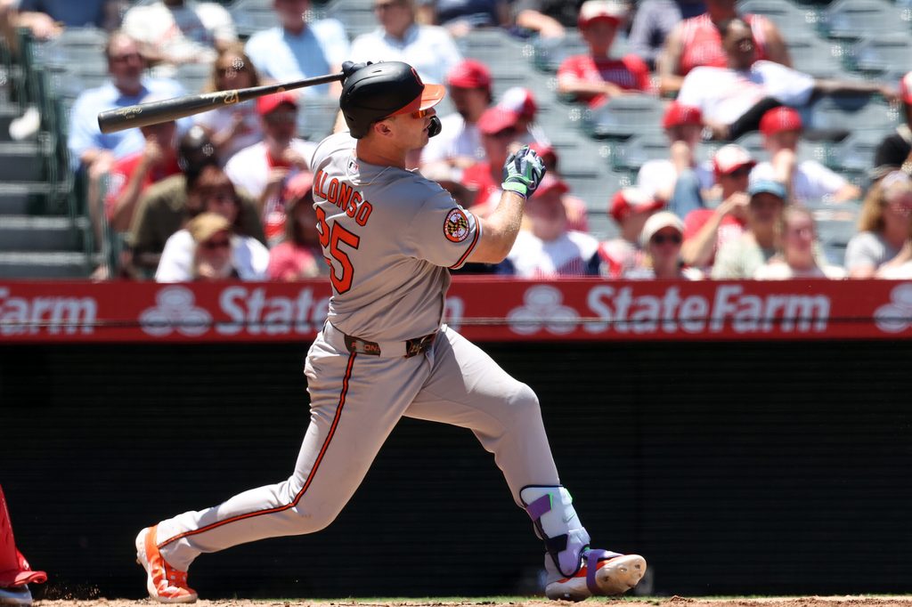 Jun 24, 2026; Anaheim, California, USA; Baltimore Orioles first baseman Pete Alonso (25) hits an RBI double during the third inning against the Los Angeles Angels at Angel Stadium. Mandatory Credit: Kiyoshi Mio-Imagn Images