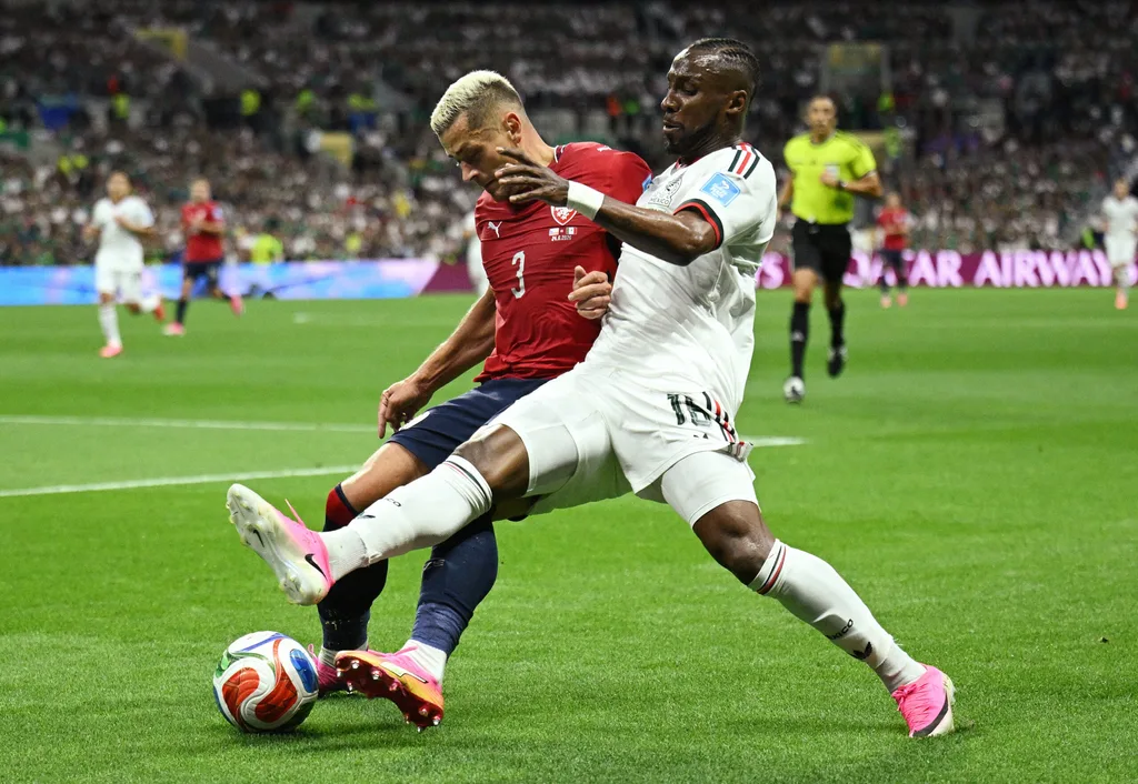 June 24, 2026; Mexico City, Mexico; Mexico's Julian Quinones in action with Czech Republic's Tomas Holes. Mandatory Credit: Annegret Hilse-Reuters via Imagn Images