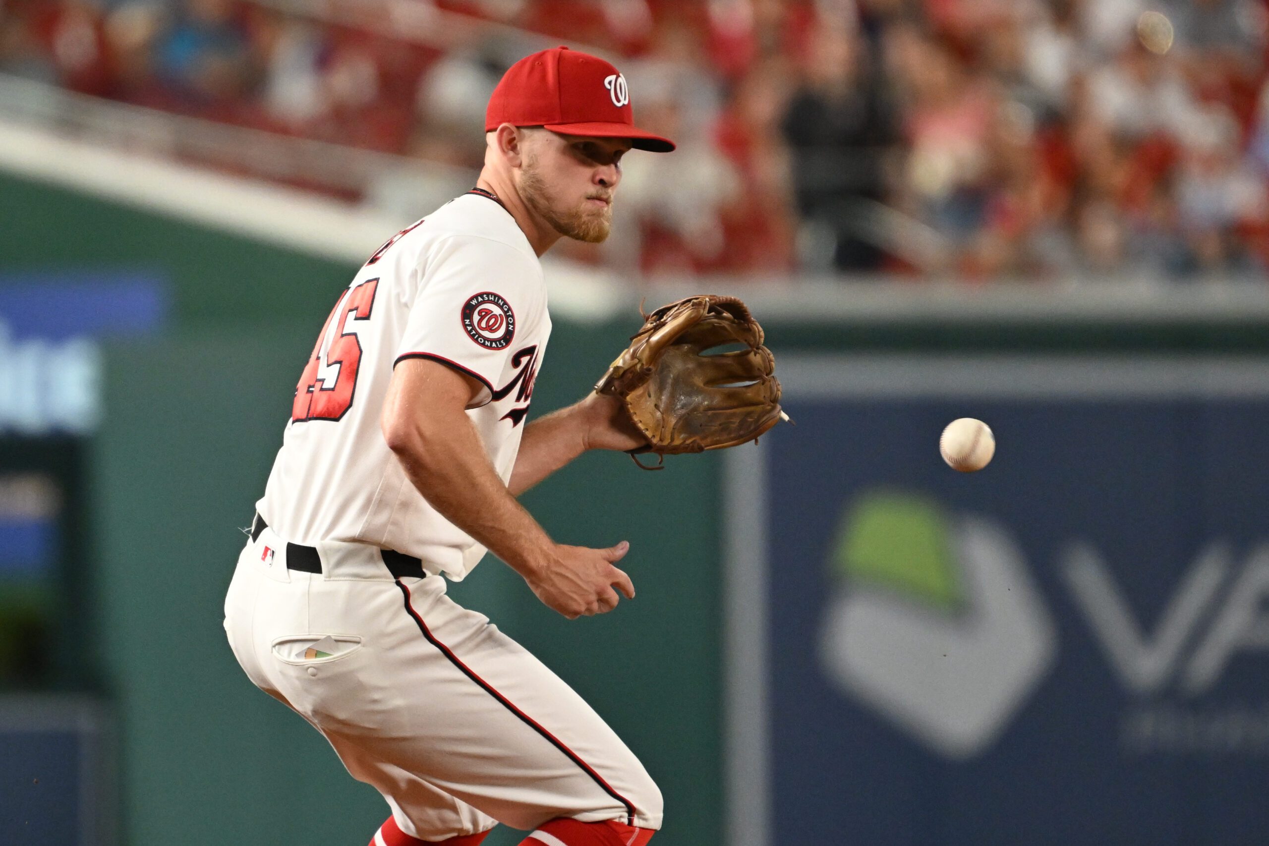 Jun 24, 2026; Washington, District of Columbia, USA; Washington Nationals third baseman Curtis Mead (45) fields a ground ball against the Philadelphia Phillies during the ninth inning at Nationals Park. Mandatory Credit: Rafael Suanes-Imagn Images