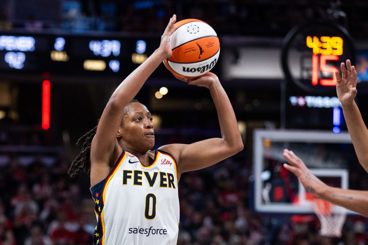 Jun 24, 2026; Indianapolis, Indiana, USA; Indiana Fever guard Kelsey Mitchell (0) shoots the ball in the second half  against the Phoenix Mercury at Gainbridge Fieldhouse. Mandatory Credit: Trevor Ruszkowski-Imagn Images
