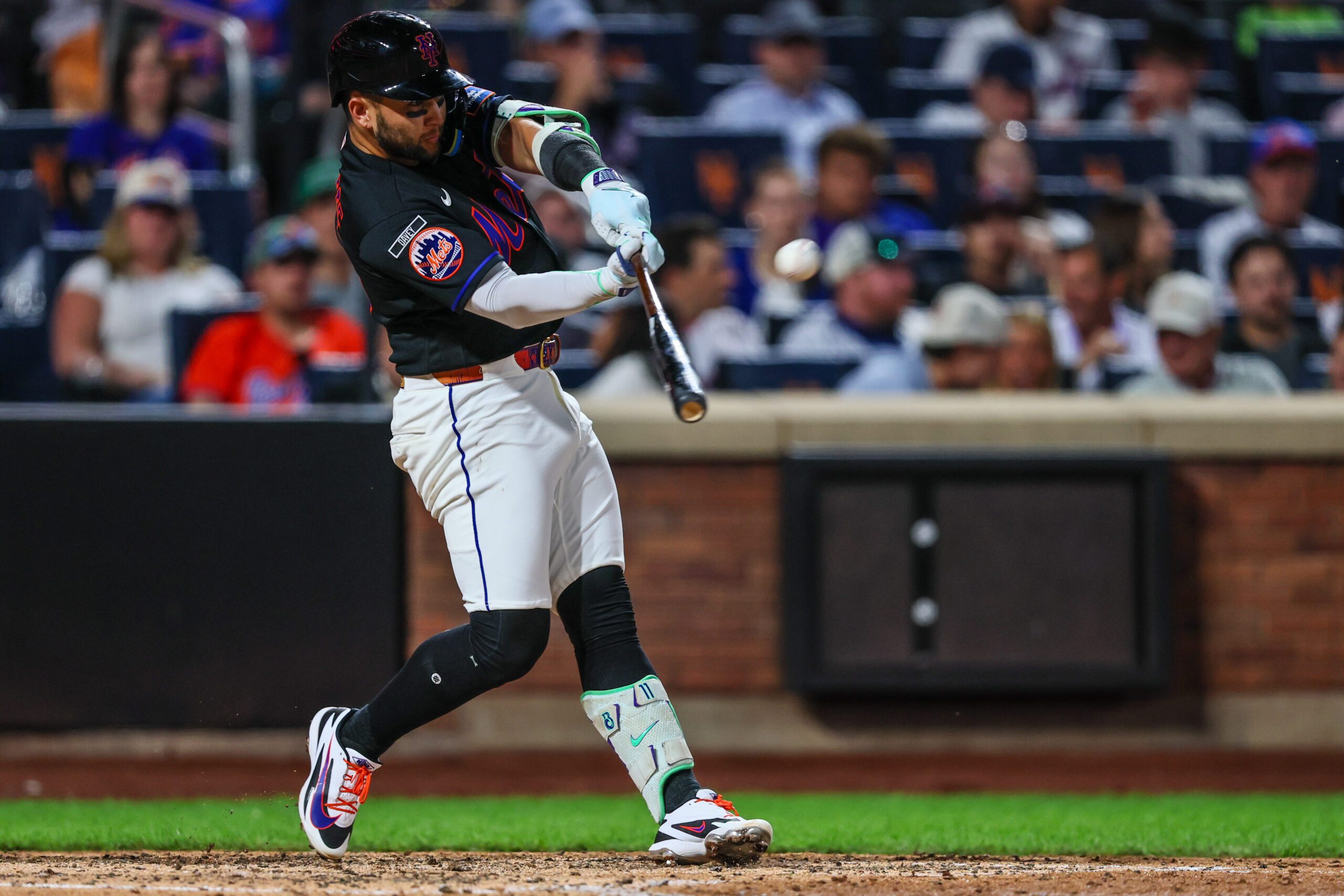Jun 24, 2026; New York City, New York, USA;  New York Mets third baseman Bo Bichette (19) hits a solo home run during the sixth inning against the Chicago Cubs at Citi Field. Mandatory Credit: Vincent Carchietta-Imagn Images