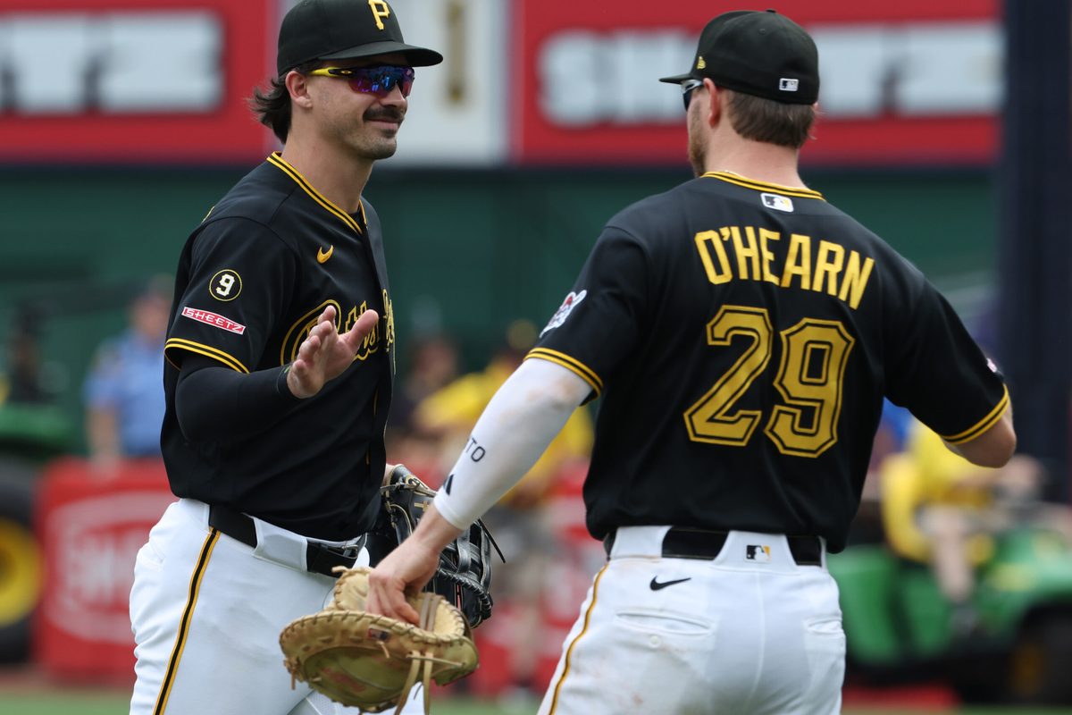 Jun 25, 2026; Pittsburgh, Pennsylvania, USA;  Pittsburgh Pirates left fielder Bryan Reynolds (left) and first baseman Ryan O'Hearn (29) celebrate after defeating the Seattle Mariners at PNC Park. Mandatory Credit: Charles LeClaire-Imagn Images