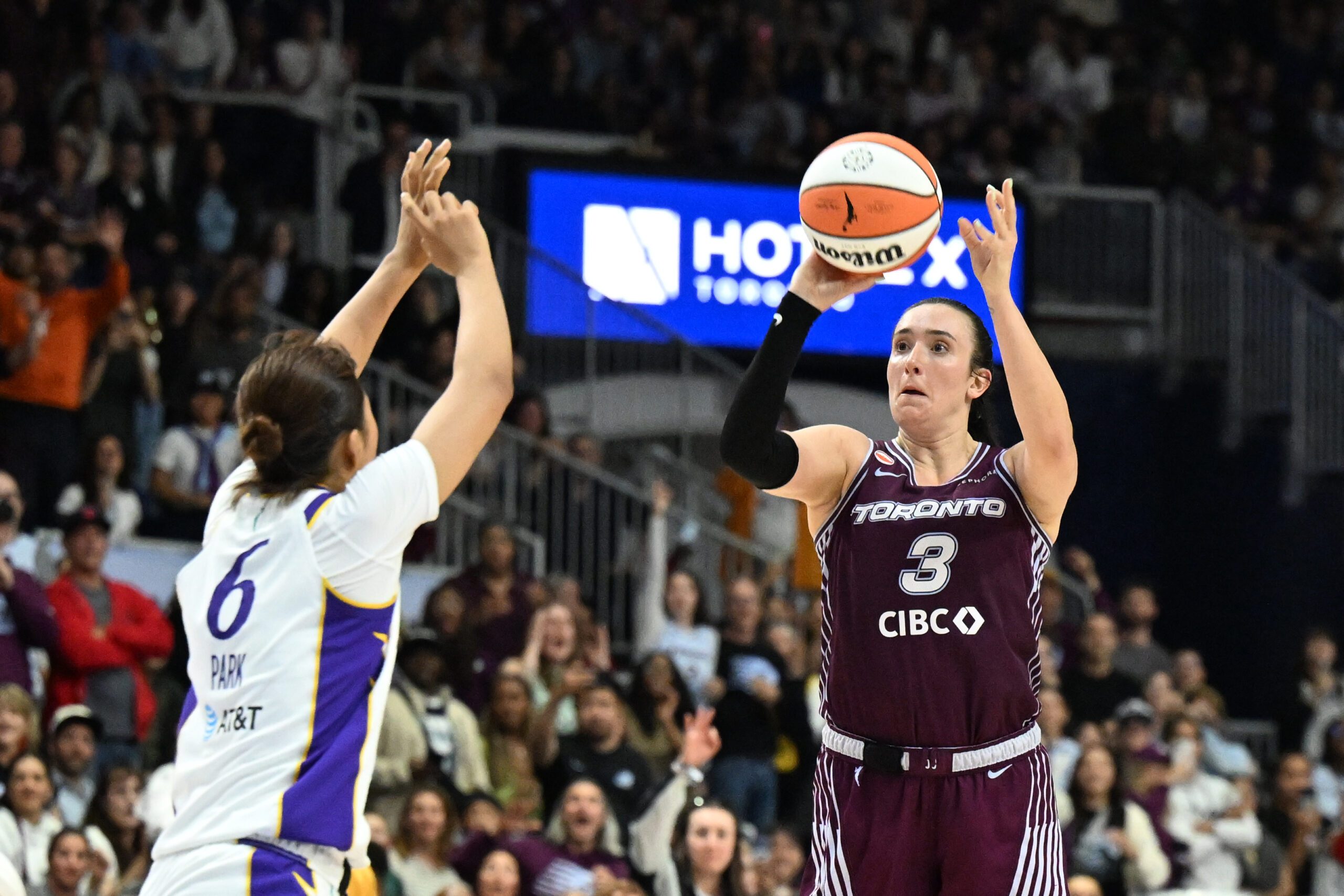 Jun 25, 2026; Toronto, Ontario, CAN; Toronto Tempo guard Marina Mabrey (3) shoots the ball as Los Angeles Sparks forward Jihyun Park (6) defends in the second half at Coca-Cola Coliseum. Mandatory Credit: Dan Hamilton-Imagn Images