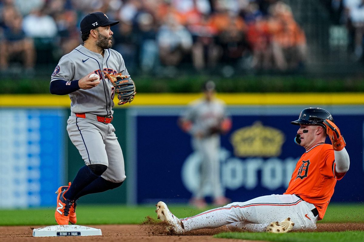 Detroit Tigers shortstop Kevin McGonigle (7) slides for second base against Houston Astros second baseman Jose Altuve (27) during the sixth inning  at Comerica Park in Detroit on Friday, June 26, 2026.