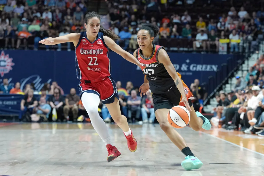Jun 26, 2026; Uncasville, Connecticut, USA; Connecticut Sun guard Leila Lacan (47) dribbles the ball against Washington Mystics guard Sonia Citron (22) during the second half at Mohegan Sun Arena. Mandatory Credit: Gregory Fisher-Imagn Images