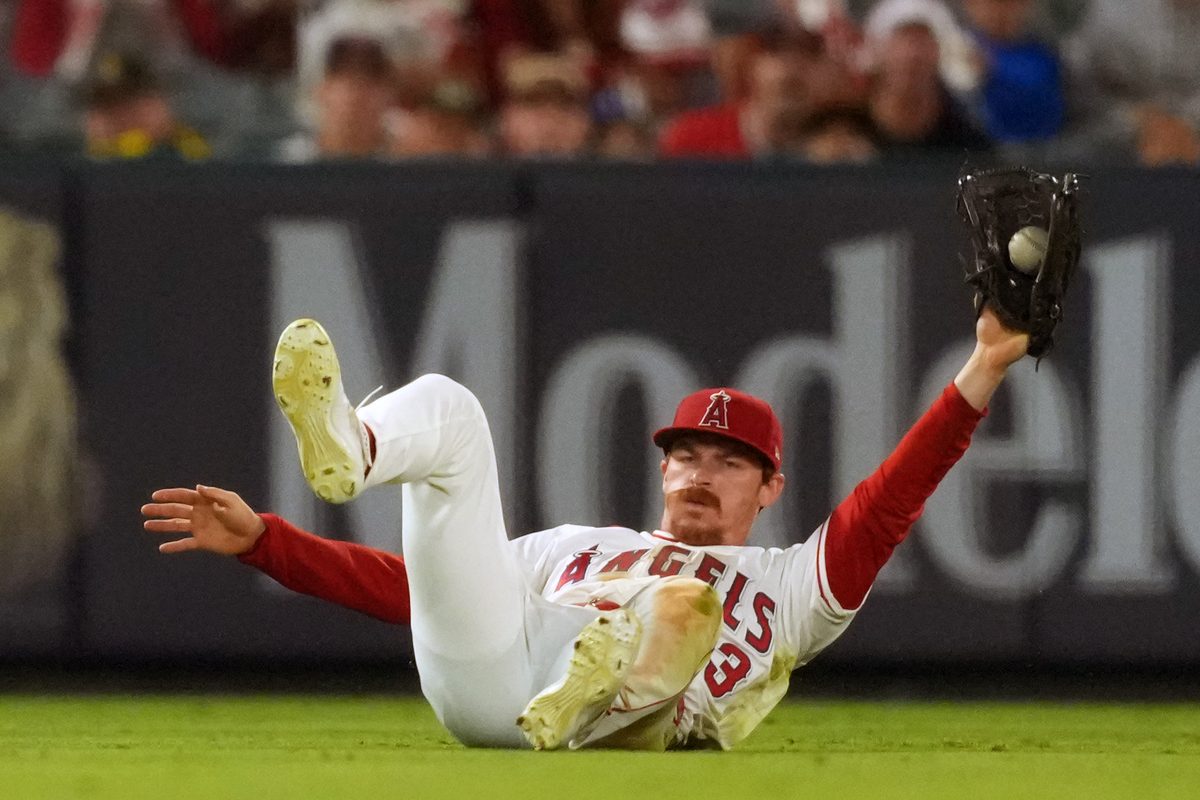 Jun 26, 2026; Anaheim, California, USA; Los Angeles Angels pitcher Chase Silseth (63) catches a fly ball by Athletics shortstop Alika Williams (not pictured) in the eighth inning at Angel Stadium. Mandatory Credit: Kirby Lee-Imagn Images