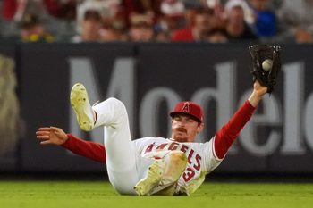 Jun 26, 2026; Anaheim, California, USA; Los Angeles Angels pitcher Chase Silseth (63) catches a fly ball by Athletics shortstop Alika Williams (not pictured) in the eighth inning at Angel Stadium. Mandatory Credit: Kirby Lee-Imagn Images