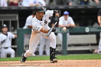 Jun 27, 2026; Chicago, Illinois, USA; Chicago White Sox right fielder Braden Montgomery (24) bunts for a single against the Kansas City Royals during the ninth inning at Rate Field. Mandatory Credit: Patrick Gorski-Imagn Images