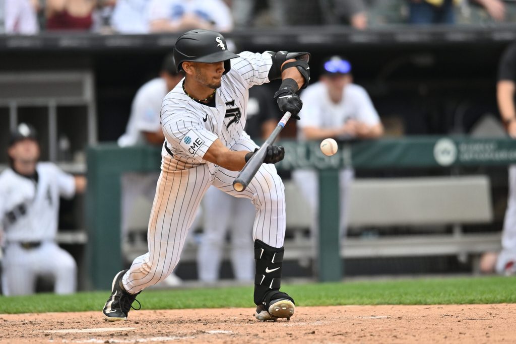 Jun 27, 2026; Chicago, Illinois, USA; Chicago White Sox right fielder Braden Montgomery (24) bunts for a single against the Kansas City Royals during the ninth inning at Rate Field. Mandatory Credit: Patrick Gorski-Imagn Images