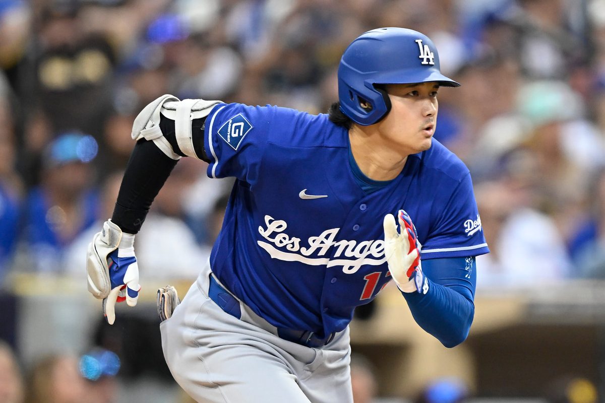 Jun 27, 2026; San Diego, California, USA; Los Angeles Dodgers designated hitter Shohei Ohtani (17) runs after hitting a single during the sixth inning against the San Diego Padres at Petco Park. Mandatory Credit: Denis Poroy-Imagn Images
