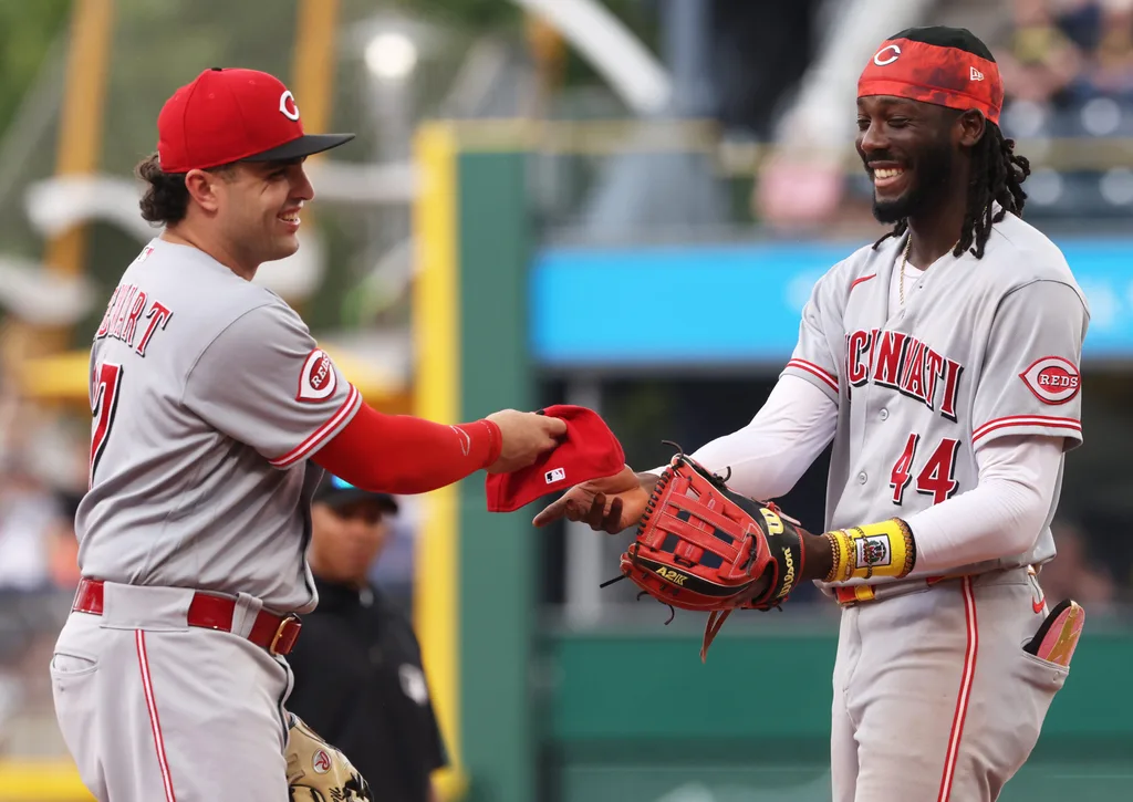 Jun 28, 2026; Pittsburgh, Pennsylvania, USA; Cincinnati Reds first baseman Sal Stewart (27) reacts with shortstop Elly de la Cruz (44) against the Pittsburgh Pirates during the seventh inning at PNC Park. Mandatory Credit: Charles LeClaire-Imagn Images