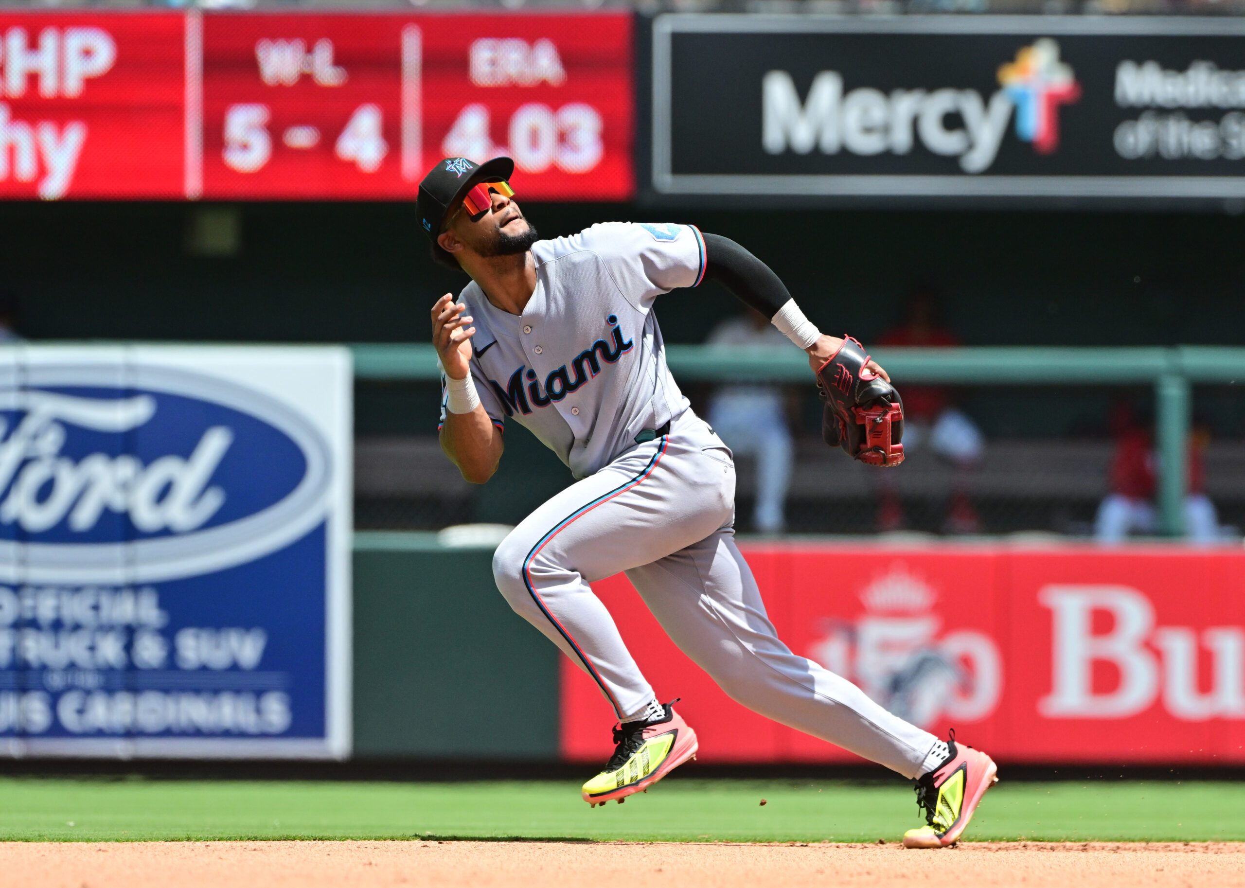 Jun 28, 2026; St. Louis, Missouri, USA; Miami Marlins shortstop Otto Lopez (6) runs to the outfield for a St. Louis Cardinals fly ball at Busch Stadium. Mandatory Credit: Tim Vizer-Imagn Images