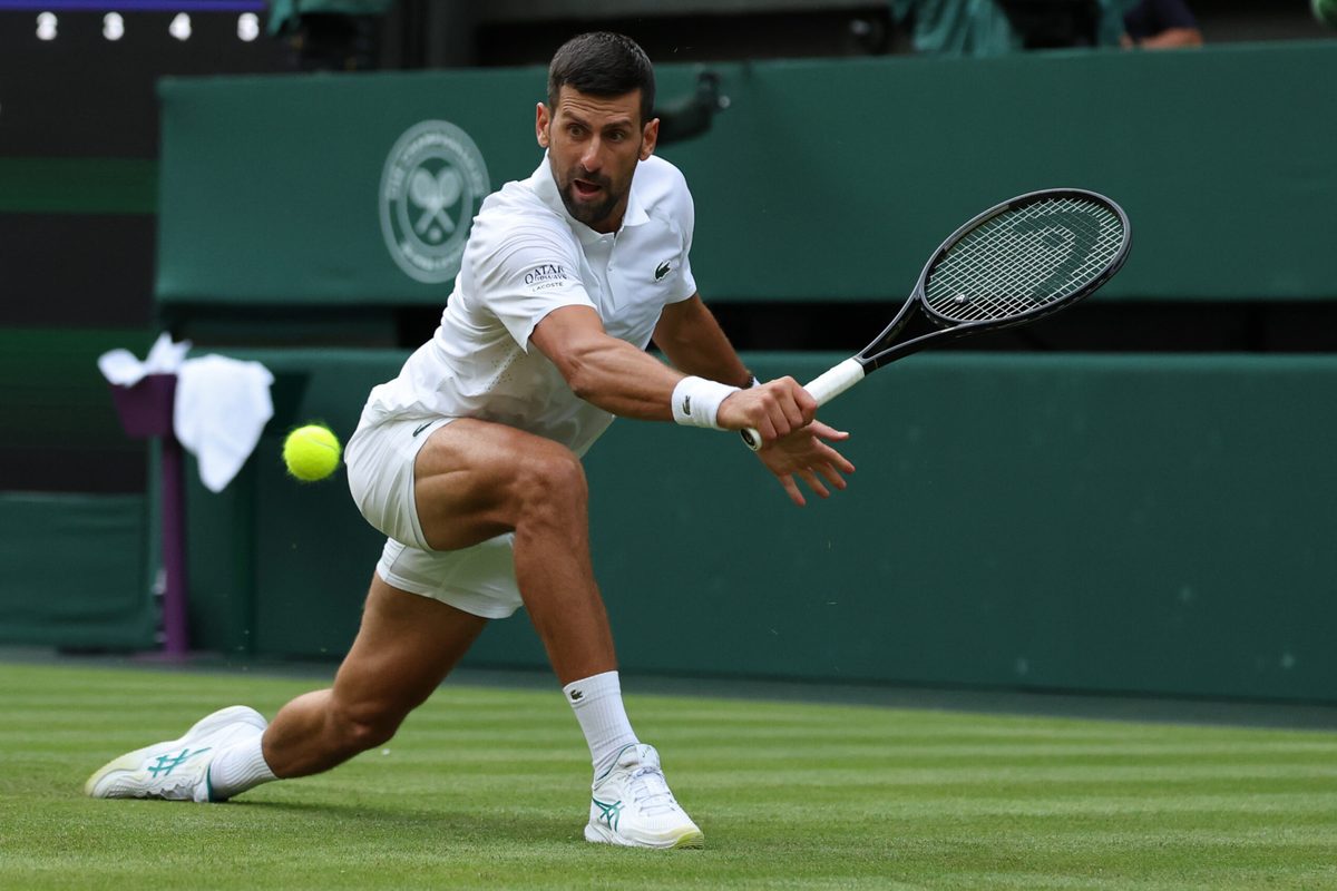 Jun 29, 2026; London, United Kingdom; Novak Djokovic (SRB) reaches for a backhand against Yibing Wu (CHN) (not pictured) on day one of The Championships Wimbledon 2026  at All England Lawn Tennis and Croquet Club. Mandatory Credit: Geoff Burke-Imagn Images