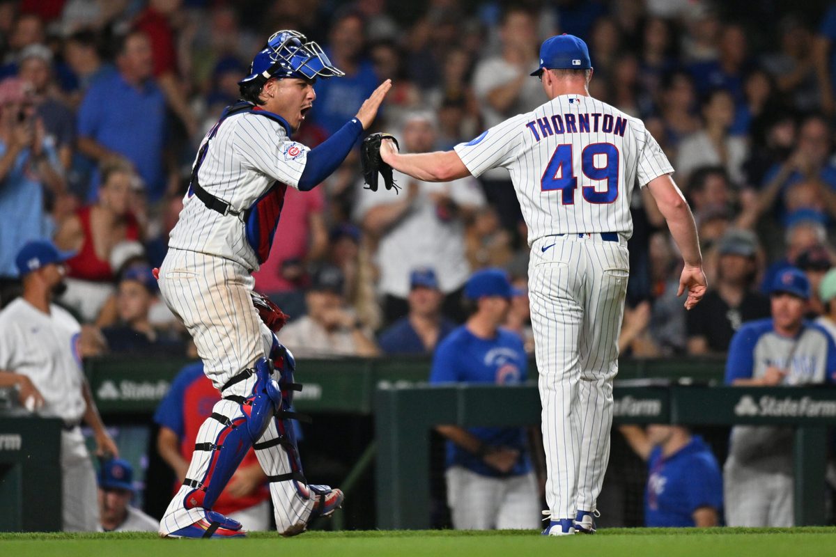 Jun 29, 2026; Chicago, Illinois, USA; Chicago Cubs catcher Miguel Amaya (9) celebrates with pitcher Trent Thornton (49) after ending the top of the ninth inning against the San Diego Padres at Wrigley Field. Mandatory Credit: Patrick Gorski-Imagn Images